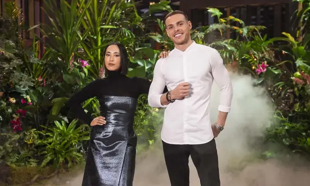 Two judges from MasterChef Dessert Masters Italia stand in front of a lush green backdrop with smoke effects.